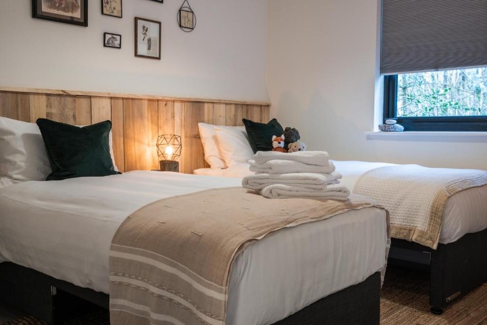 A bedroom inside a Drumhierny chalet